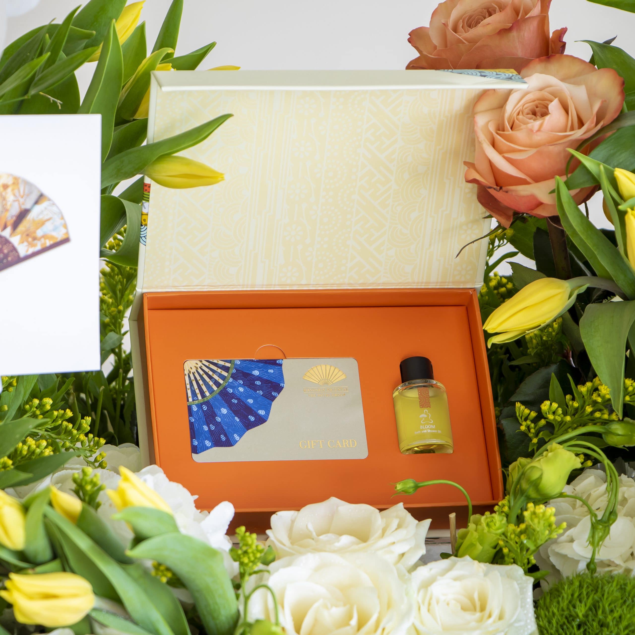 Mandarin QAR1999 close up Close up of spa voucher with flowers