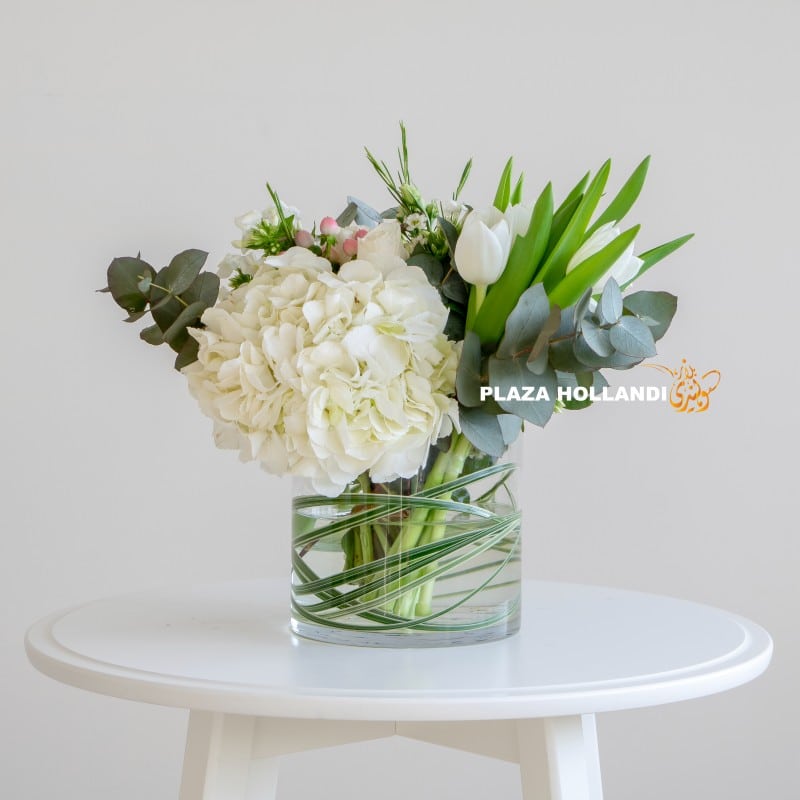 Rana Plaza Hollandi white hydrangea arrangement