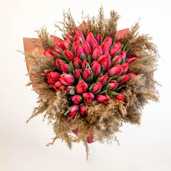 Be My Valentine Red tulips with pampas grass wrapped in paper