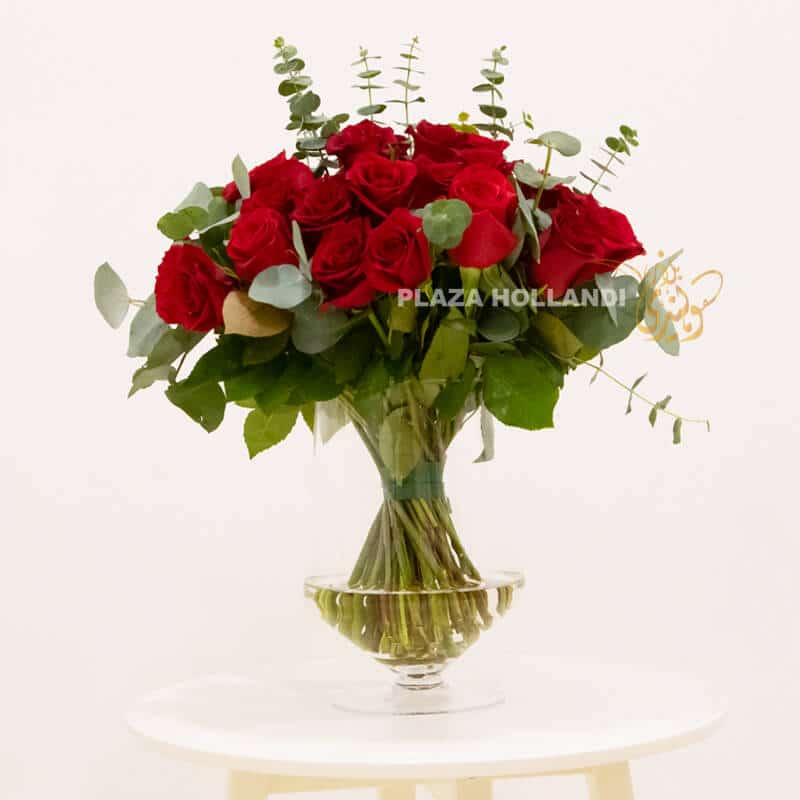 GV4 50 red roses with eucalyptus in a vase
