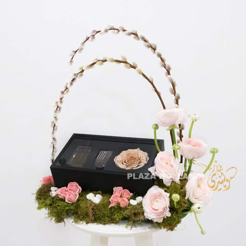 Pretty peach perfume arrangement Pretty peach perfume set with fresh flowers and a long lasting rose