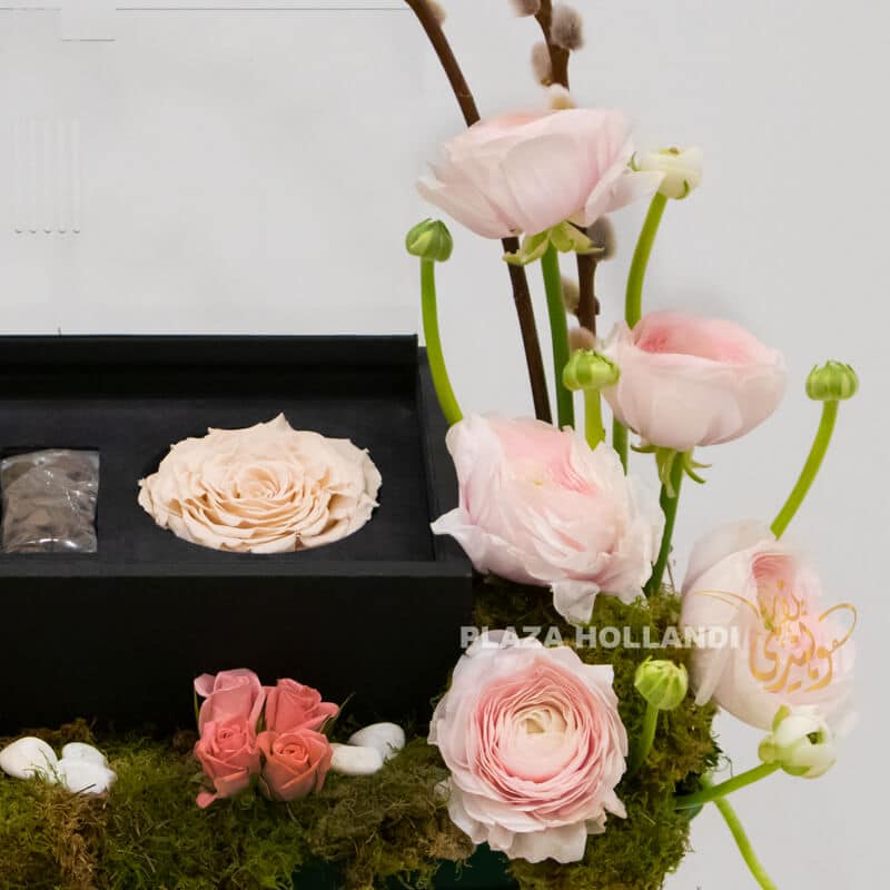 close up of flowers close up of ranunculus and a long lasting rose