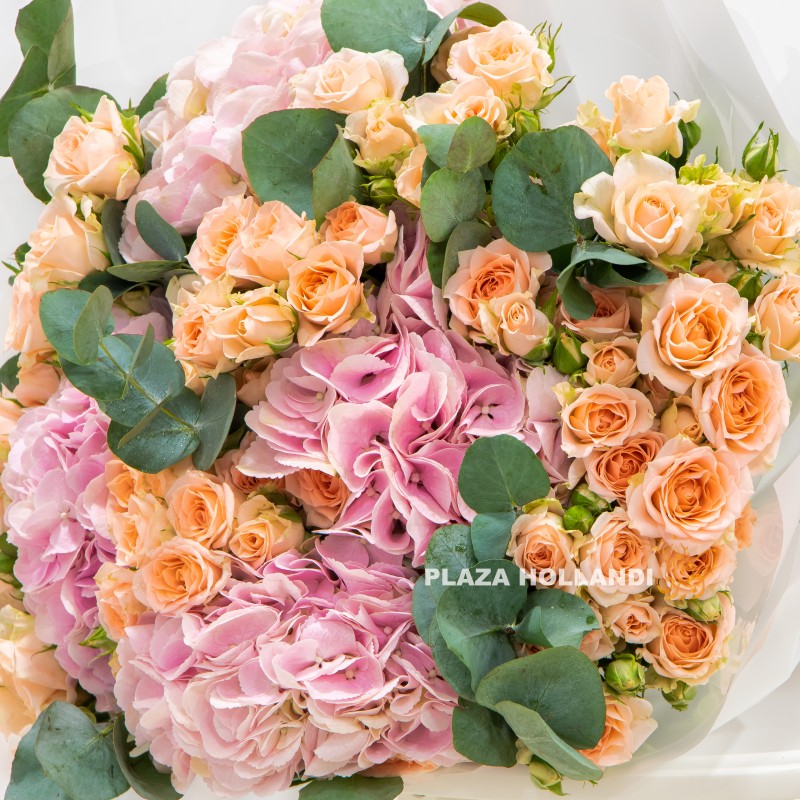 1.3 close up of pink hydrangea, peach spray roses and eucalyptus